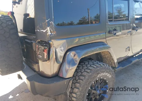 2014 Jeep Wrangler Unlimited Sahara z USA, uszkodzony, nr VIN 1C4BJWEG8EL207160